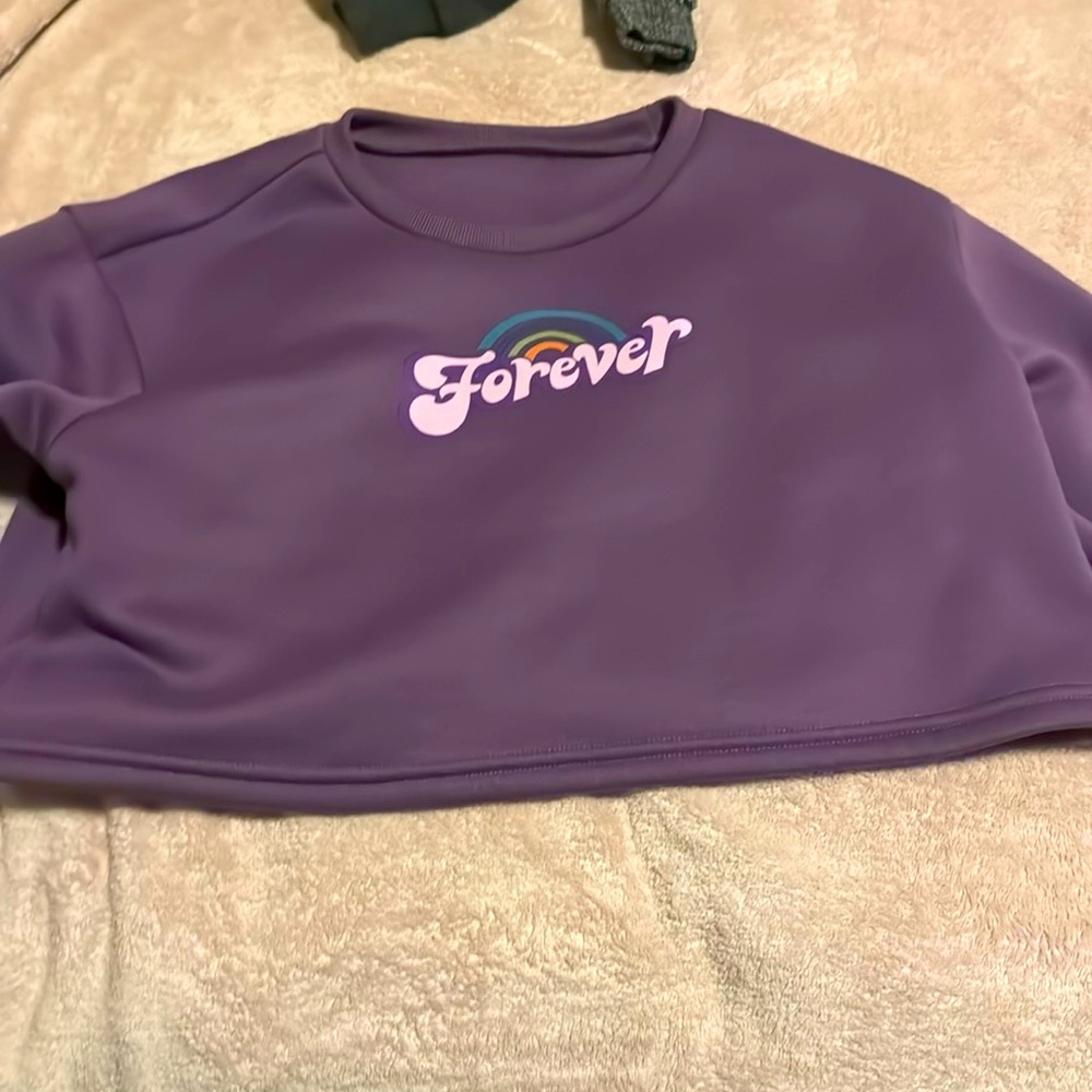 purple crewneck with rainbow